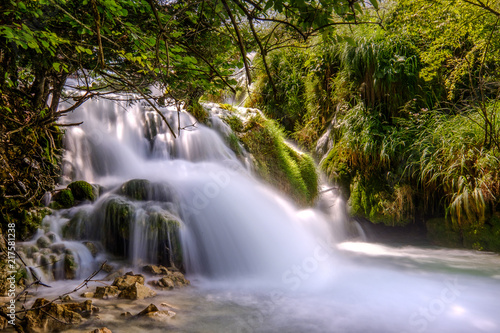 Waterfalls in green forest. Plitvice Lakes National Park. Croatia