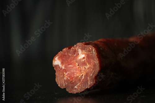 salami cheese-dried smoked sliced ​​slices (sausages) . food background.  Top view with copy space