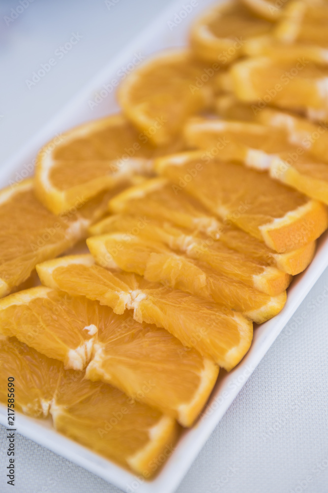 slices of Sicilian oranges are white tray slices of Sicilian oranges are white tray