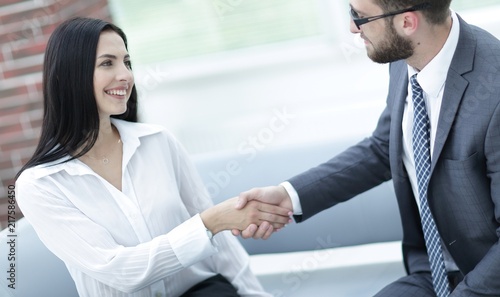 Wallpaper Mural handshake of manager and client sitting in the office lobby. Torontodigital.ca