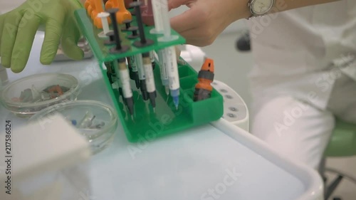 Dentist office preparing for dental composite fillings,doctor and nurse 