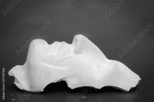 This is not a work of art! The author does not need a release. This is an ordinary plaster head used for teaching students at the Institute of Photography. Shooting in the studio on a black background