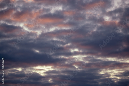 Multicolored clouds at sunset as an abstract background