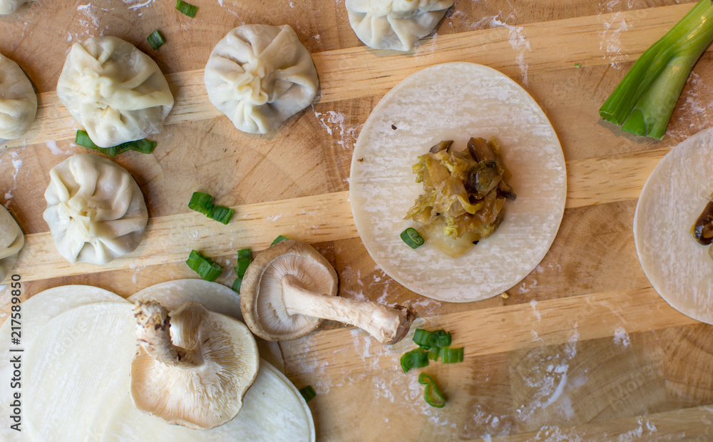 Food Flat lay cooking with Mushrooms making fresh dumplings gourmet food photography ingredients and food prep background