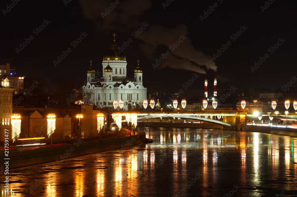 Night view of the Cathedral of Christ the Saviour and the Big Stone bridge in Moscow, Russia