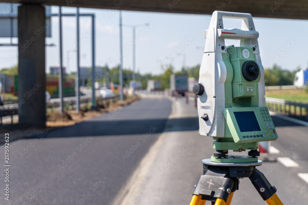 Surveyor equipment (theodolit) on construction site Surveyor equipment (theodolit) on construction site