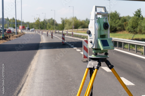 Foto Surveyor equipment (theodolite) on construction site