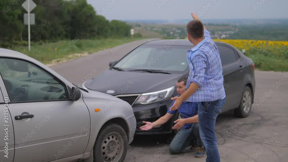 Two men arguing conflict after a car accident on the road car lifestyle insurance. slow motion video. Two Drivers man Arguing After Traffic Accident. auto insurance accident concept men Two men arguing conflict after a car accident on the road car lifestyle insurance. slow motion video. Two Drivers man Arguing After Traffic Accident. auto insurance accident concept men