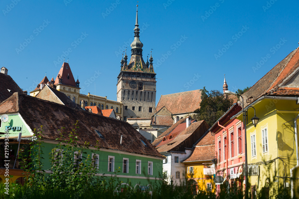 Streets of Sighisoara with clock tower, Romania