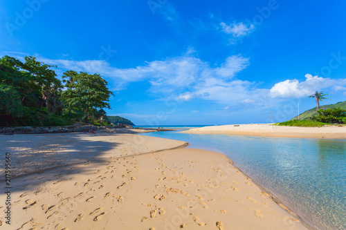 Fototapeta Naklejka Na Ścianę i Meble -  sea water in canal from the sea flow down the sea when low tide at Nai Harn beach Phuket