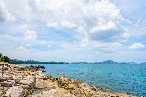 Beautiful natural landscape of rock along the coastline with blue sea under the summer sky at Koh Samui island, Surat Thani province, Thailand