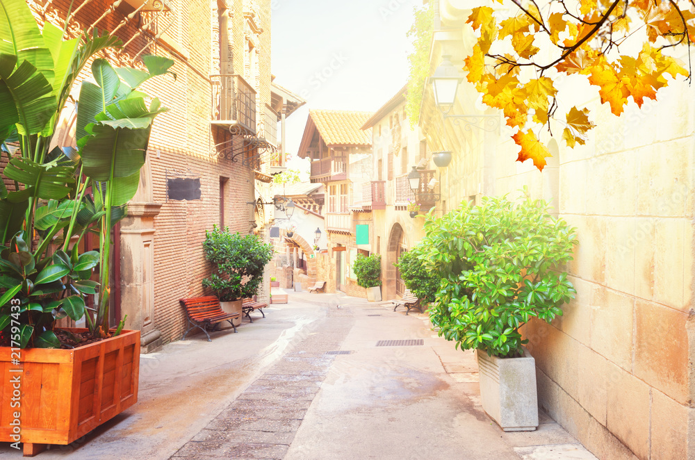 Poble Espanyol street with sunlight at fall, traditional architecture site in Barcelona, Catalonia Spain
