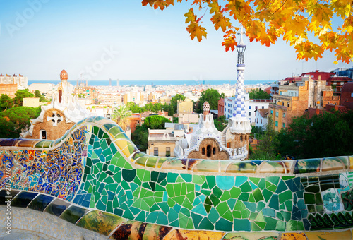 Gaudi bench and cityscape of Barcelona from park Guell, famous view of Barcelona, Spain at fall photo
