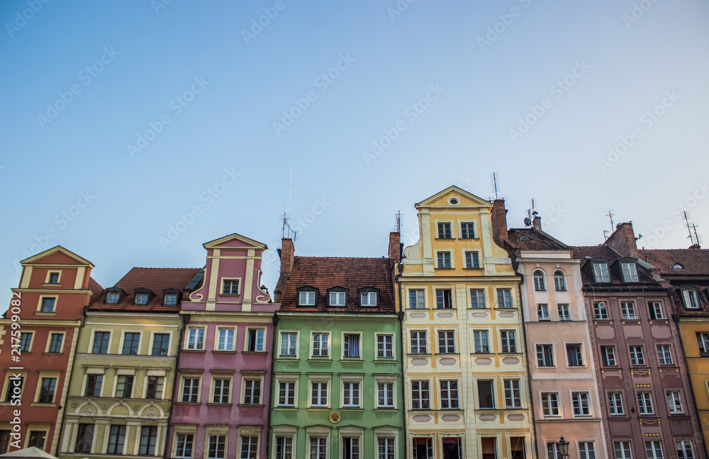 soft focus cozy small architecture concept of colorful facades buildings in contrast summer bright day time