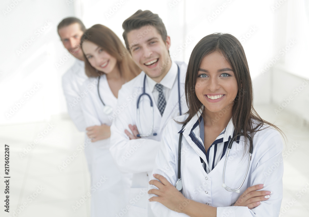 female doctor with group of happy successful colleagues female doctor with group of happy successful colleagues