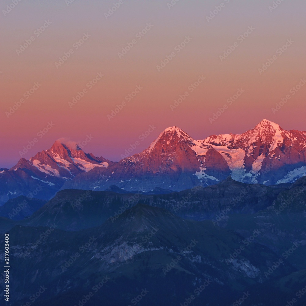 Mountains Schreckhorn, Eiger and Monch at sunset. View from Mount Niesen. Switzerland. Mountains Schreckhorn, Eiger and Monch at sunset. View from Mount Niesen. Switzerland.