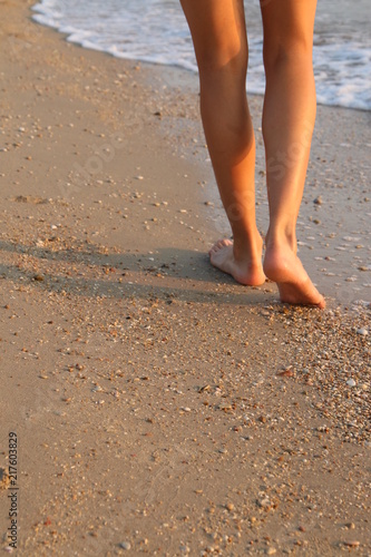 feet walking on sand