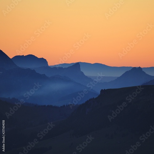 Outlines of Mount Wiriehore and other mountains in the Bernese Oberland. Sunset seen from Mount Niesen. 