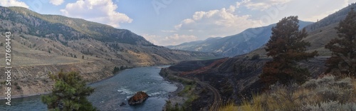 Panorama of the Thompson River with wildfire scarring on one side. Located north of Spence Bridge