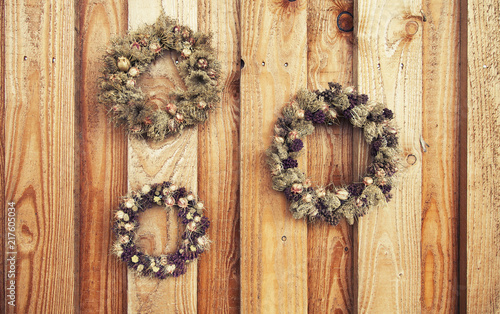 flower wreath on wooden rustic background