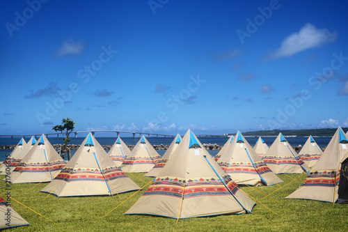 Tent village along the sea © tnehala