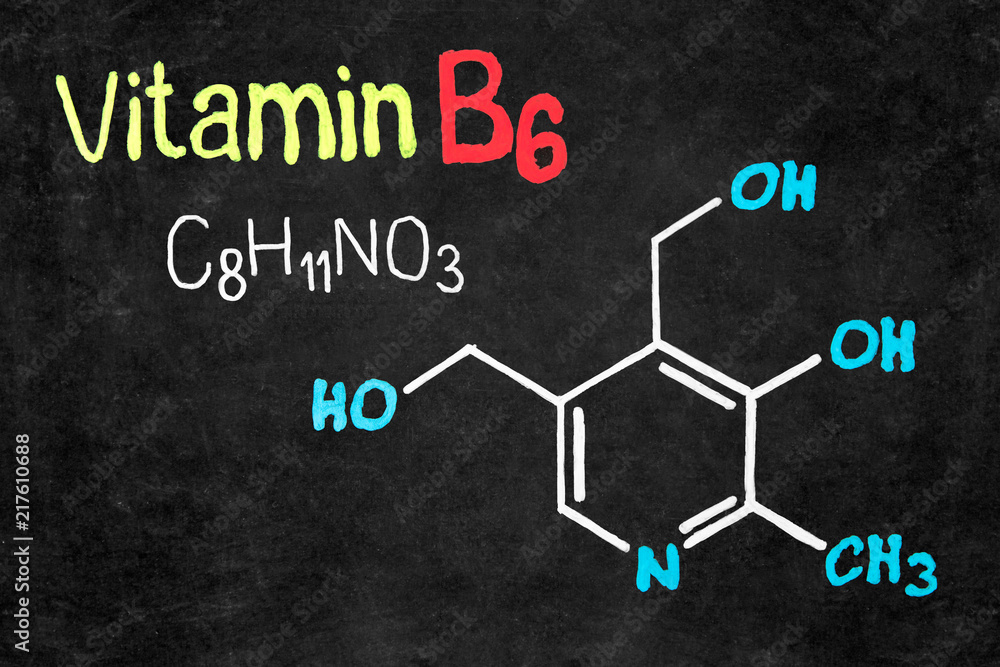 Handwritten chalk chemical formula of Vitamin B6 on school blackboard. Handwritten chalk chemical formula of Vitamin B6 on school blackboard.