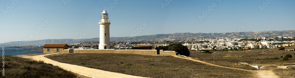 A scenic panorama of a Paphos lighthouse, city, mountains and Mediterranean sea, Cyprus