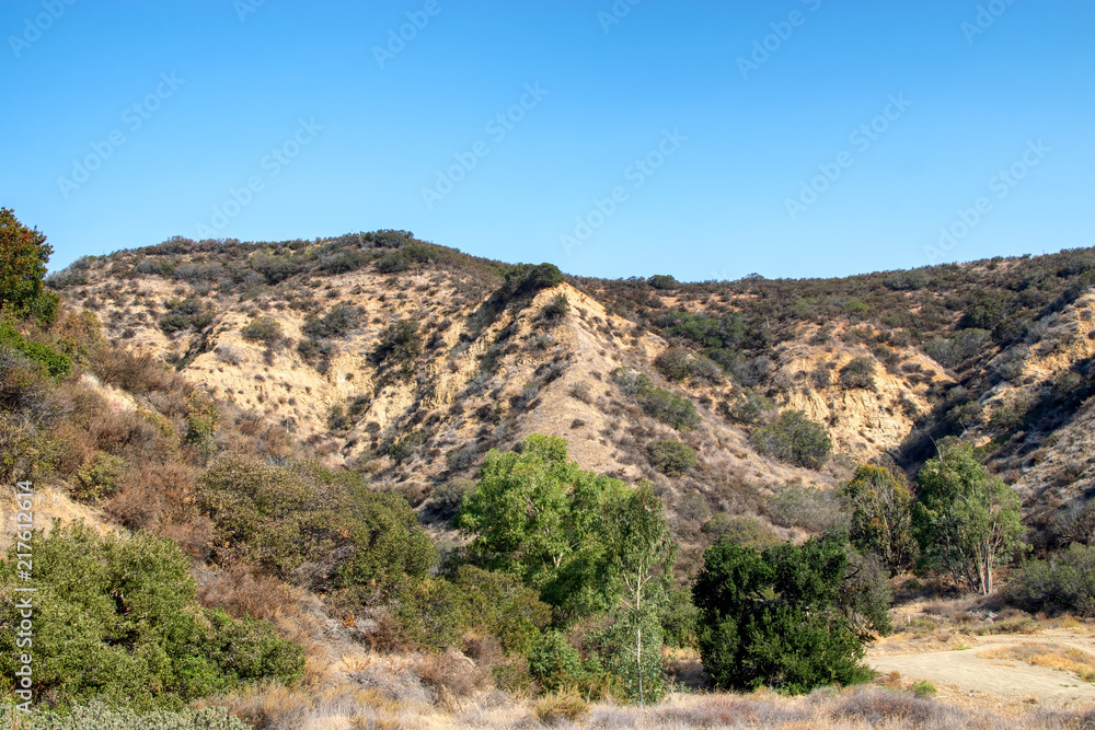 Steep, dry hillsides on hot summer day in Southern California mountains