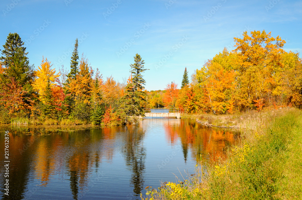 stone bridge over river autumn fall trees 