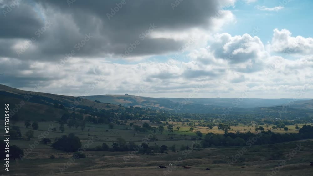 Time lapse. A Valley of Farmlands under fluffy clouds. Britain. Time lapse. A Valley of Farmlands under fluffy clouds. Britain.