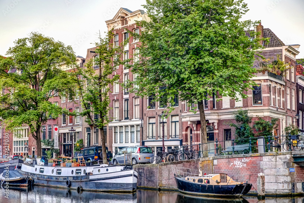 Iconic buildings and bridges along the Canals of Amsterdam