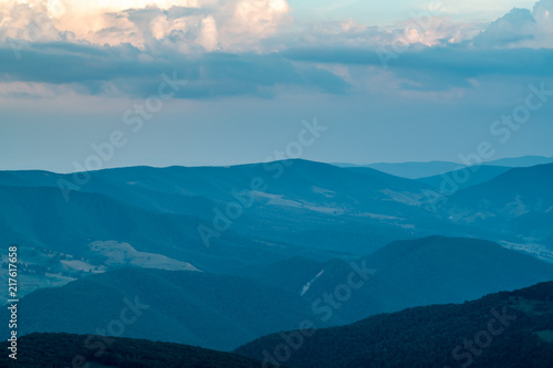 A dramatic sunset viewed from Spruce Knob West Virginia in the Appalachian Mountains looking down on hills in the surrounding valleys
