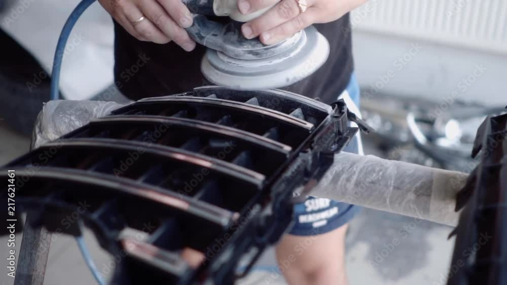 man grinds the grate before painting man grinds the grate before painting