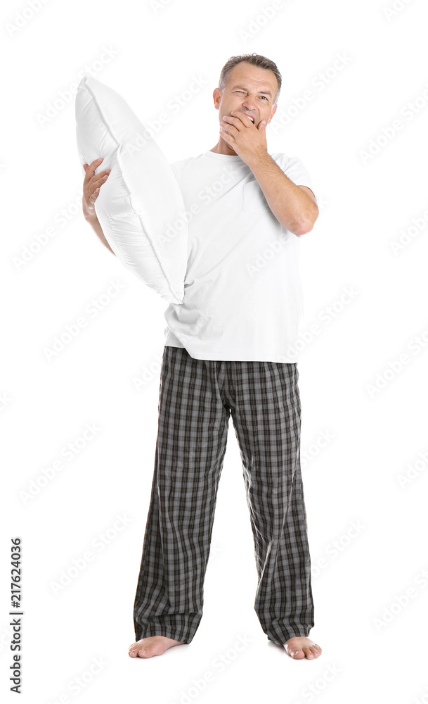 Man holding soft pillow on white background Man holding soft pillow on white background