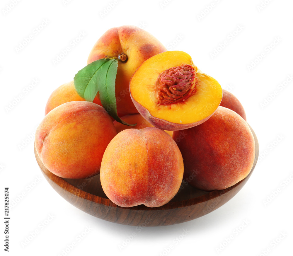 Bowl with fresh sweet peaches on white background Bowl with fresh sweet peaches on white background