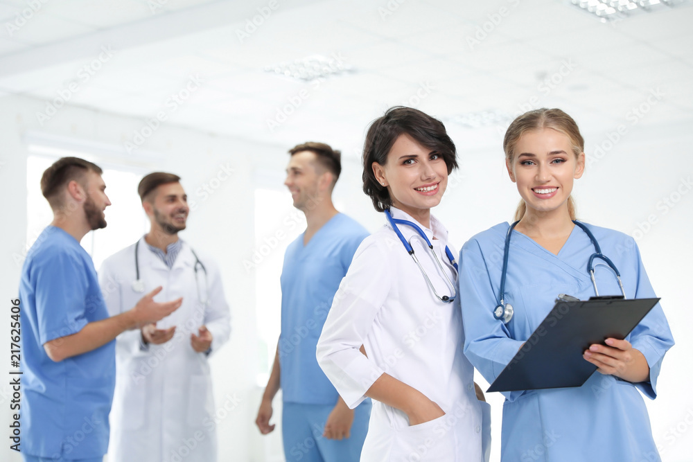 Portrait of doctors in uniform at workplace Portrait of doctors in uniform at workplace
