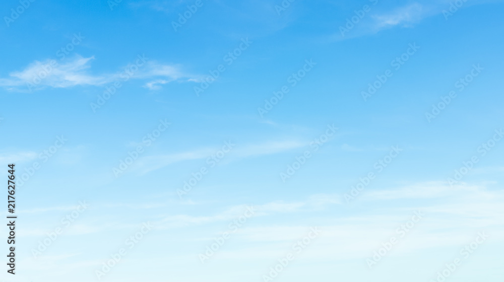 The sky is blue with clouds moving slowly The sky is blue with clouds moving slowly