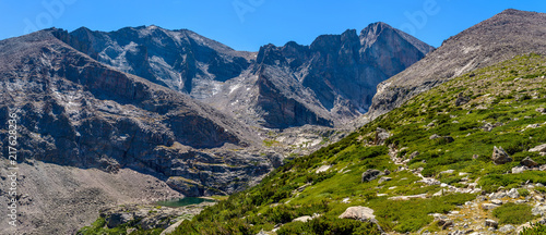 Longs Peak - A panoramic view of Longs Peak (Center-Right, 14,255 ft), with Mt. Meeker (Left) and Mt. Lady Washington (Far-Right), seen from Chasm Lake Trail, Rocky Mountain National Park, CO, USA. photo