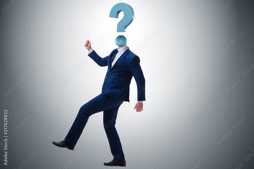 Businessman with question mark instead of head Businessman with question mark instead of head