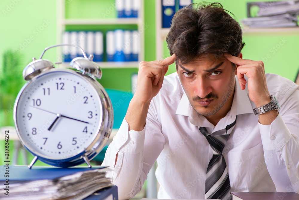 Sick and unhappy businessman sitting in the office Sick and unhappy businessman sitting in the office