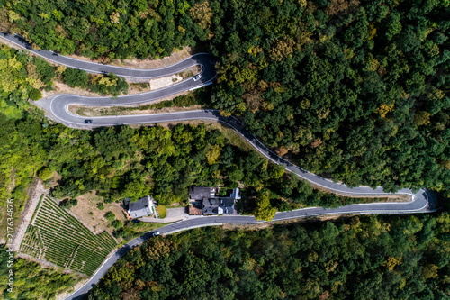 Winding road serpentine from a high mountain pass in the mosel village Brodenbach Germany Aerial view photo