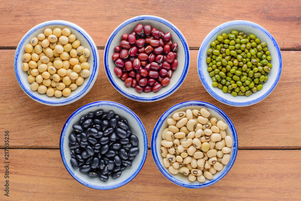 Various kinds of beans,different kinds of beans in bowl on wooden table. Various kinds of beans,different kinds of beans in bowl on wooden table.