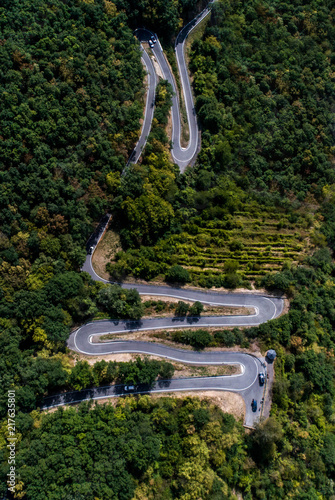 Winding road serpentine from a high mountain pass in the mosel village Brodenbach Germany Aerial view photo