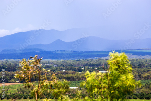 Misty hills and agricultural fields on the Atherton Tableland in Tropical North Queensland, Australia photo