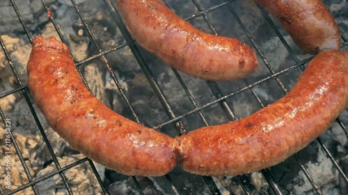 Grilled sausages on bbq. Variety Original Nuremberg Rostbratwurst . Pork ground meat, dill, nutmeg, garlic, cardamom, marjoram in the natural gut. There are also other types: rostbratwurst, currywurst photo