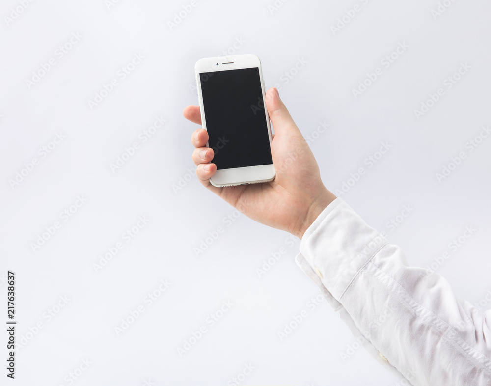 Male hand holding smartphone,mobile on white background.business and technology concepts Male hand holding smartphone,mobile on white background.business and technology concepts