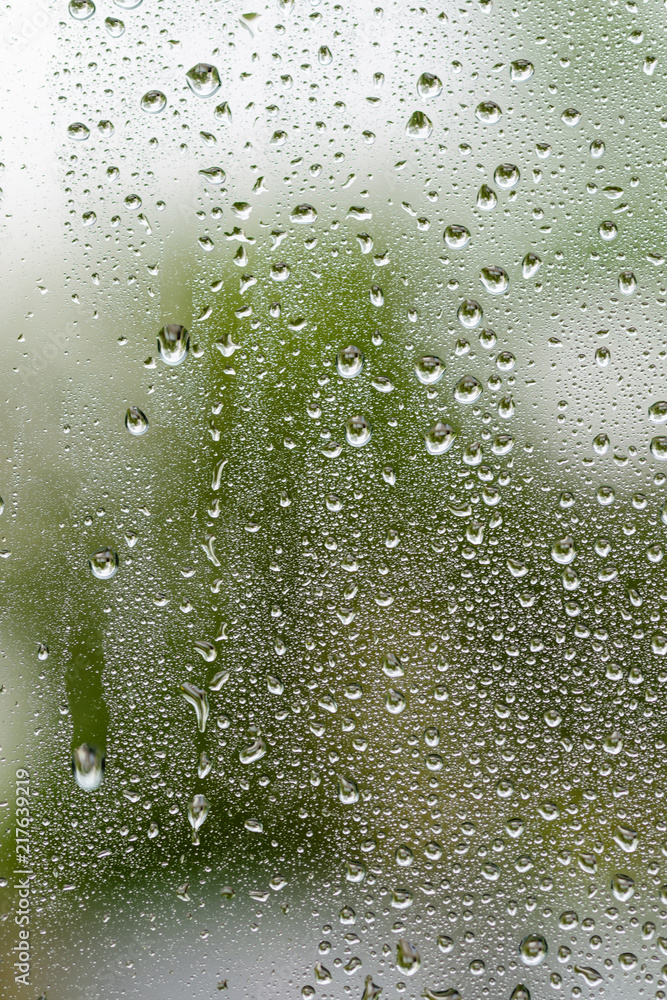 water drops from rain on window glass