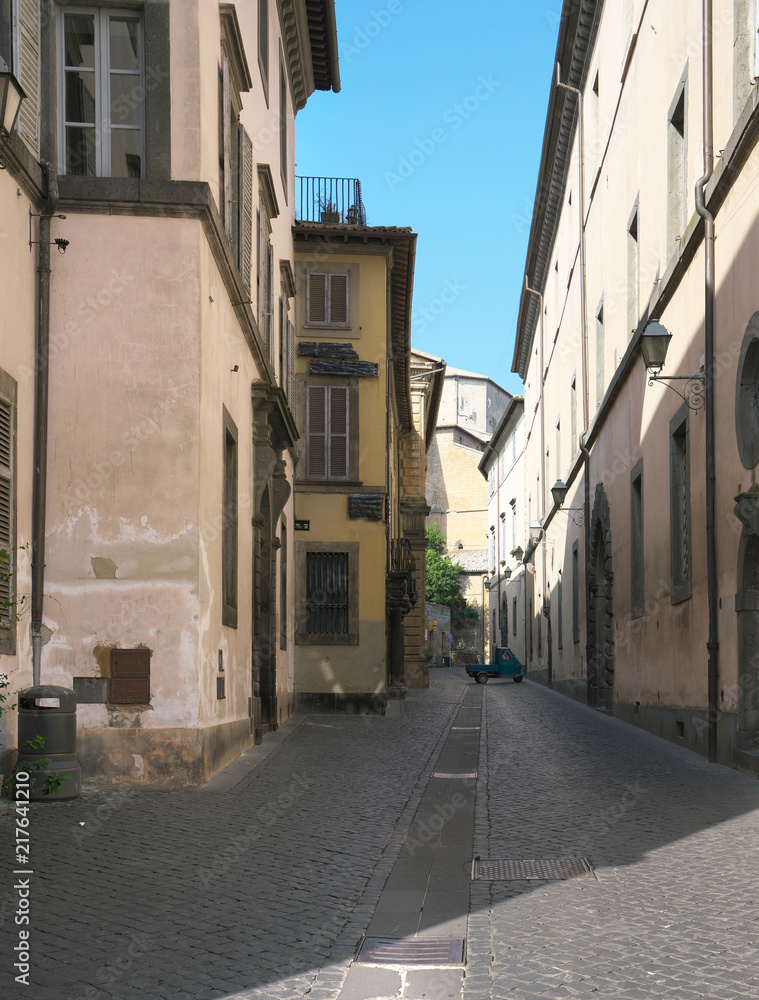 Fototapeta premium Orvieto,Italy-July 28, 2018: Alley in Orvieto, Umbria