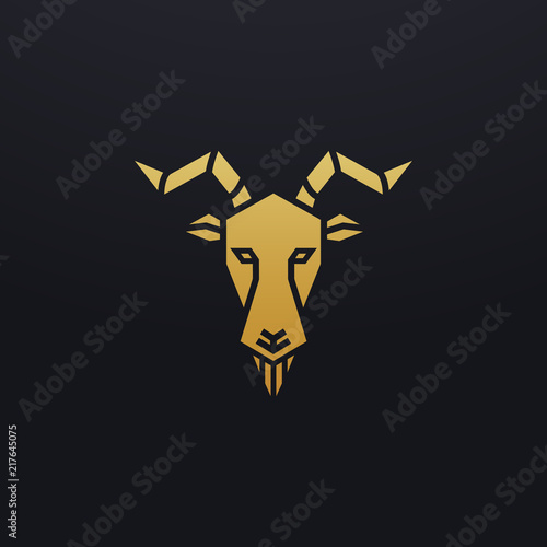 Stylized ram head icon illustration. Vector glyph, tribal goat animal design with golden color