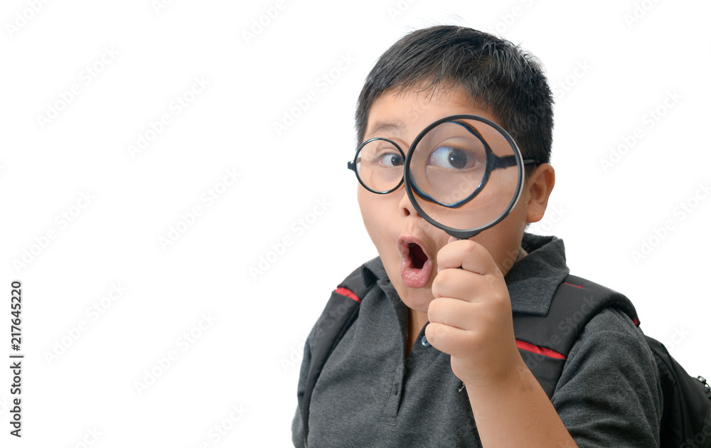 Happy asian fat boy holding magnifying glass. Happy asian fat boy holding magnifying glass.
